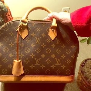 Louis Vuitton Alma pm Handbag